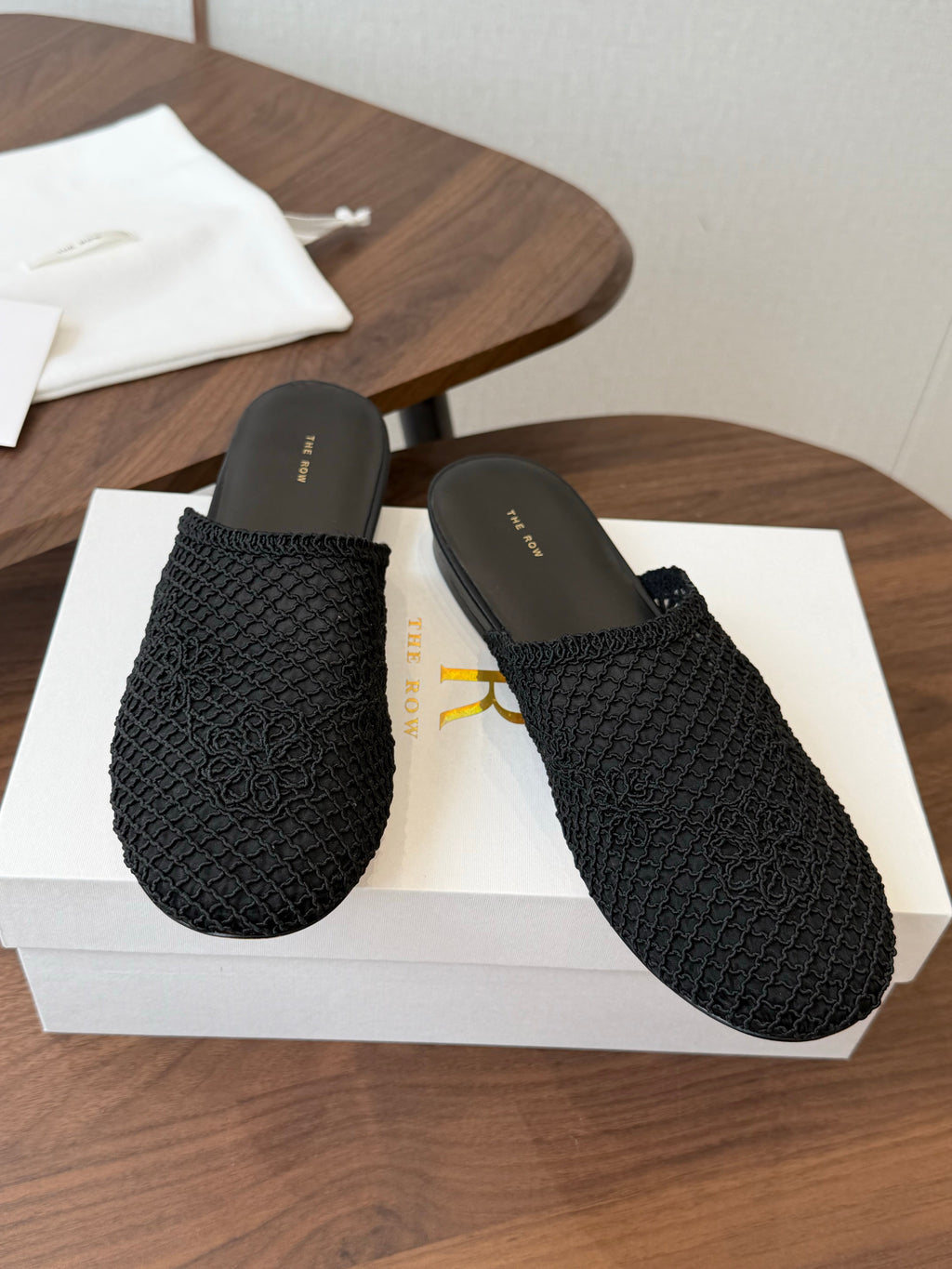 THE ROW 26S MULE FLATS IN BLACK CROCHET MESH