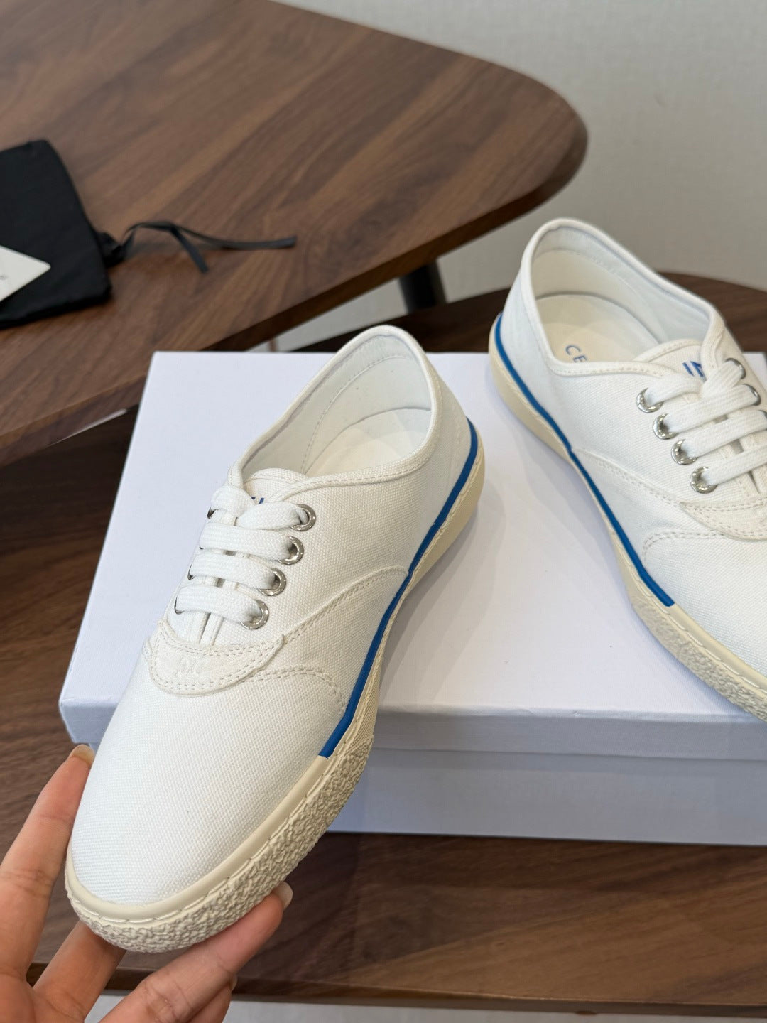 CELINE 26S TRIOMPHE LOW TOP SNEAKERS IN WHITE CANVAS BLUE TRIM