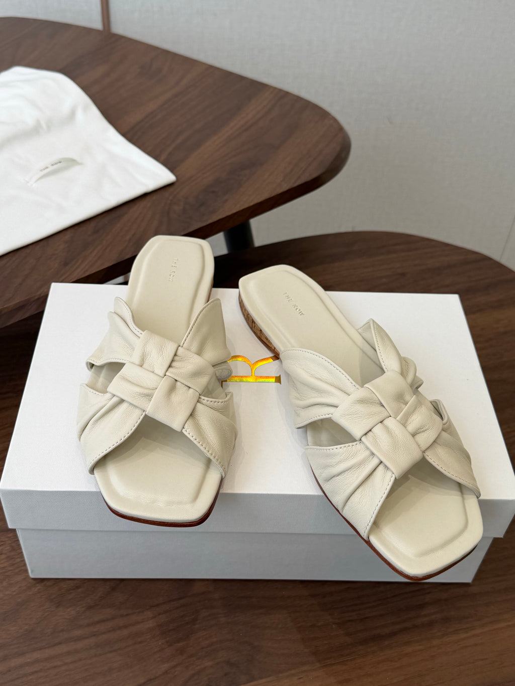 THE ROW 26S KNOT SLIDE SANDALS IN IVORY WHITE LAMBSKIN