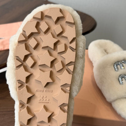 MIUMIU 26S CRYSTAL LOGO SLIDES IN LIGHT BEIGE SHEARLING