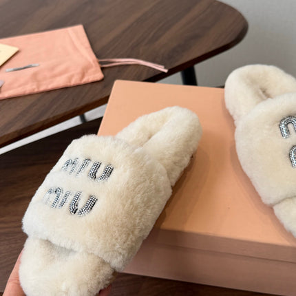 MIUMIU 26S CRYSTAL LOGO SLIDES IN LIGHT BEIGE SHEARLING