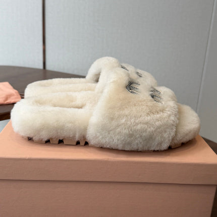 MIUMIU 26S CRYSTAL LOGO SLIDES IN LIGHT BEIGE SHEARLING