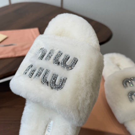 MIUMIU 26S CRYSTAL LOGO SLIDES IN WHITE SHEARLING