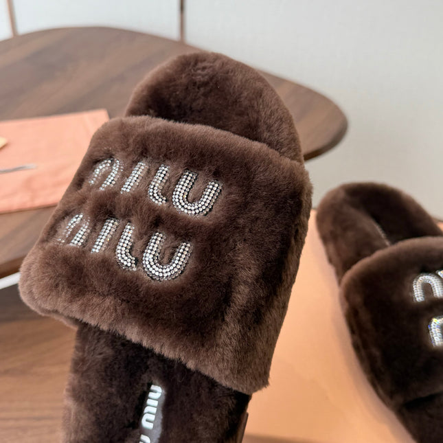 MIUMIU 26S CRYSTAL LOGO SLIDES IN DARK BROWN SHEARLING