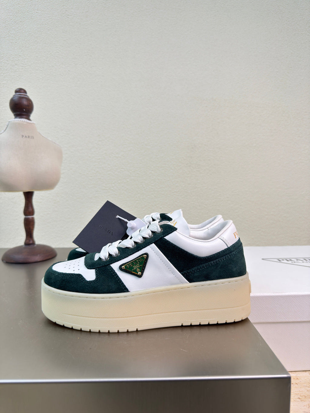 PRADA 26S DOWNTOWN THICK SOLE SNEAKERS IN WHITE CALFSKIN AND BLACK SUEDE