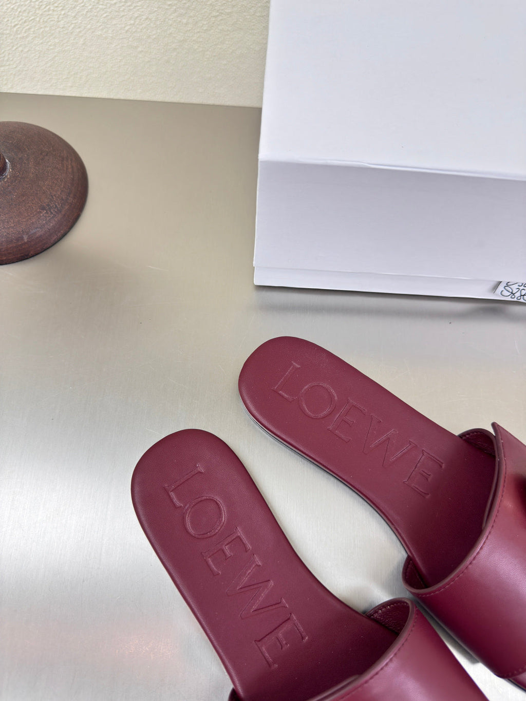 LOEWE 26S PEBBLE SLIDE IN BURGUNDY RED CALFSKIN GOLD HARDWARE