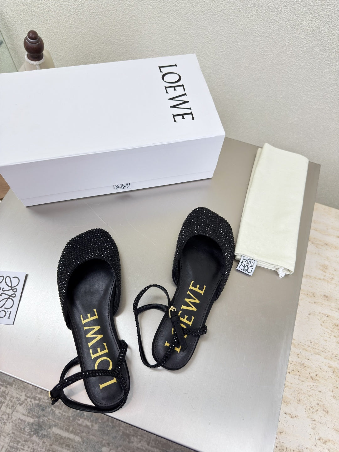 LOEWE 26S CRYSTAL-EMBELLISHED SLINGBACK FLAT PUMPS IN BLACK CALFSKIN