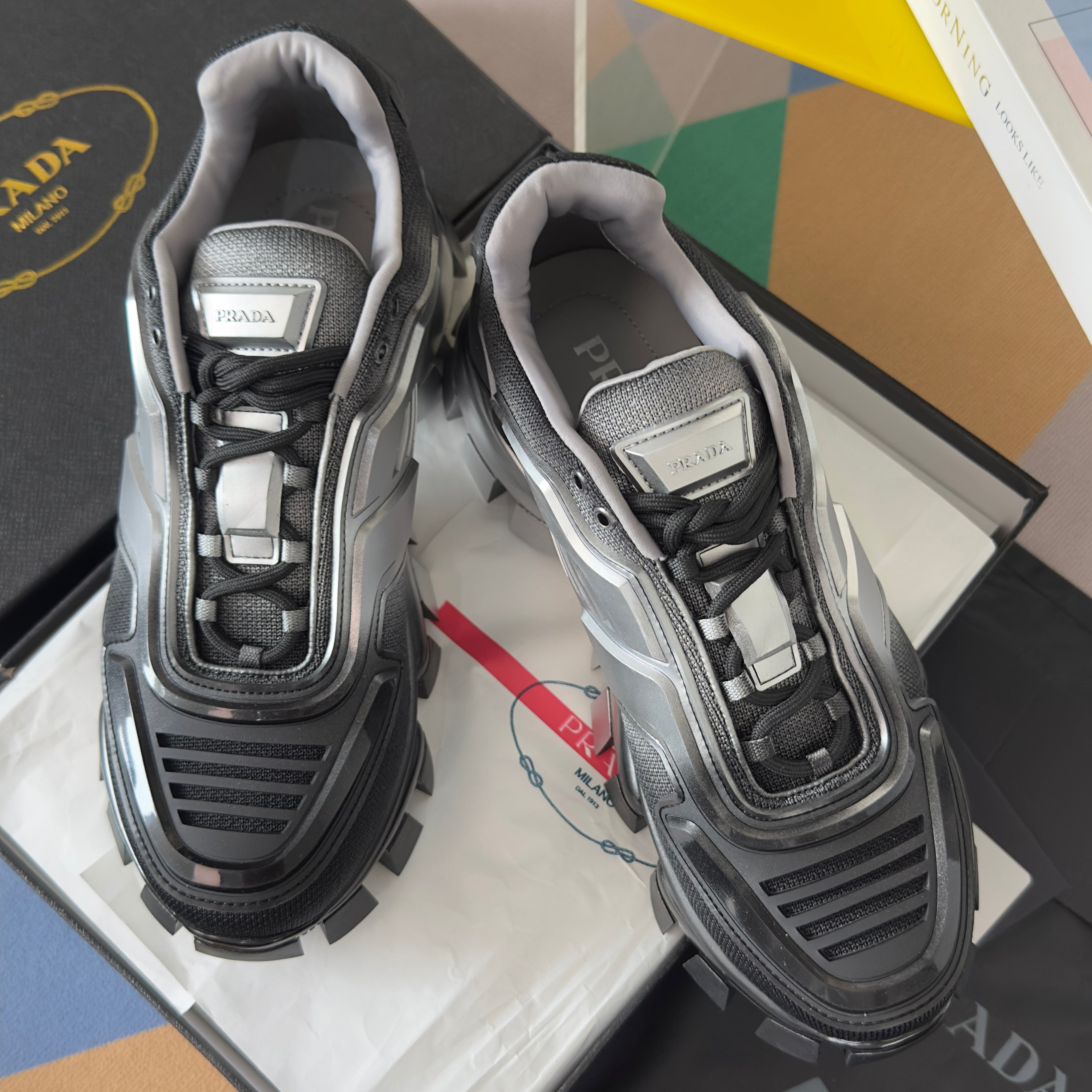 PRADA 26S CLOUDBUST THUNDER SNEAKERS 60MM IN BLACK AND SILVER MESH FABRIC AND TPU
