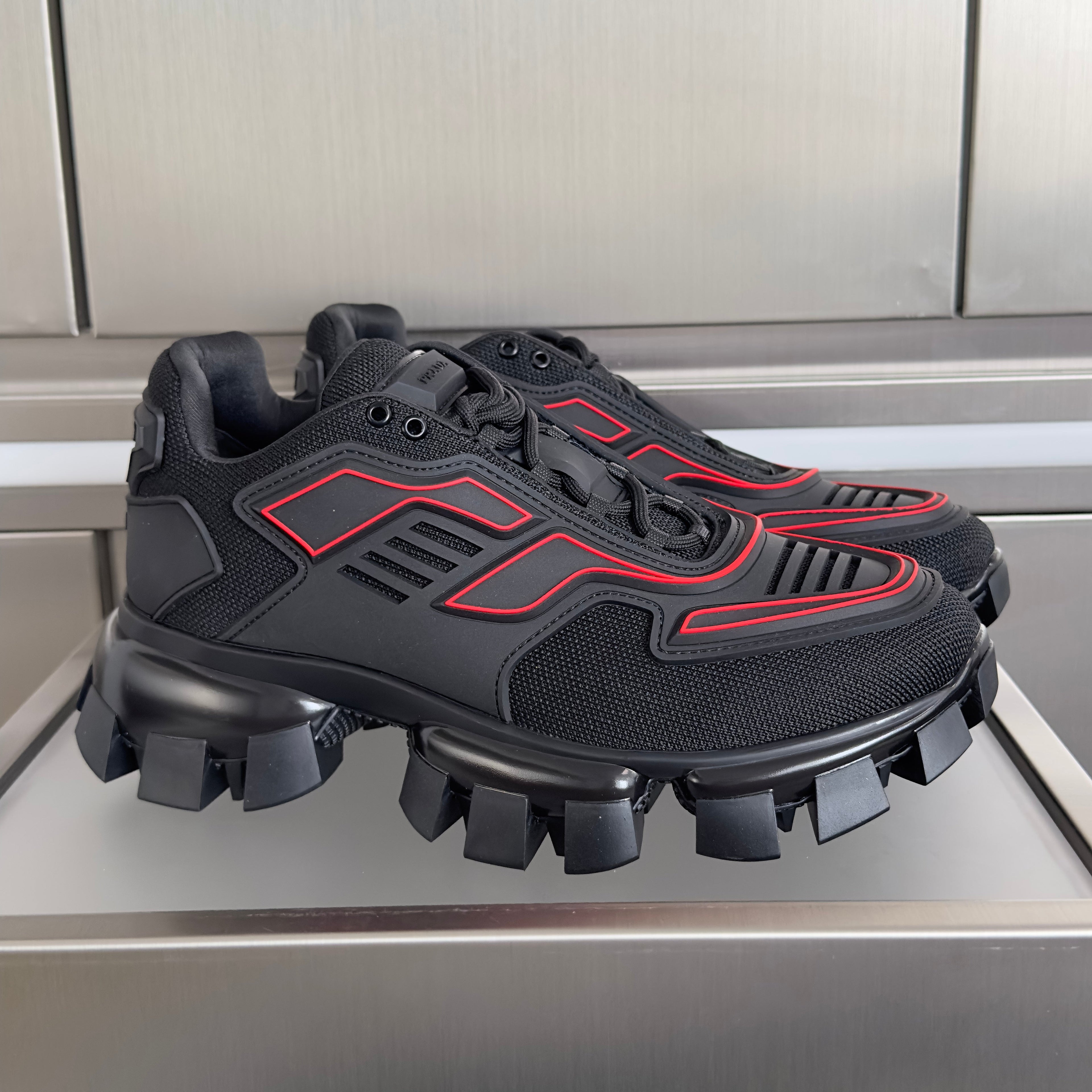 PRADA 26S CLOUDBUST THUNDER SNEAKERS 60MM IN BLACK AND RED MESH FABRIC AND TPU