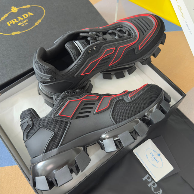 PRADA 26S CLOUDBUST THUNDER SNEAKERS 60MM IN BLACK AND RED MESH FABRIC AND TPU