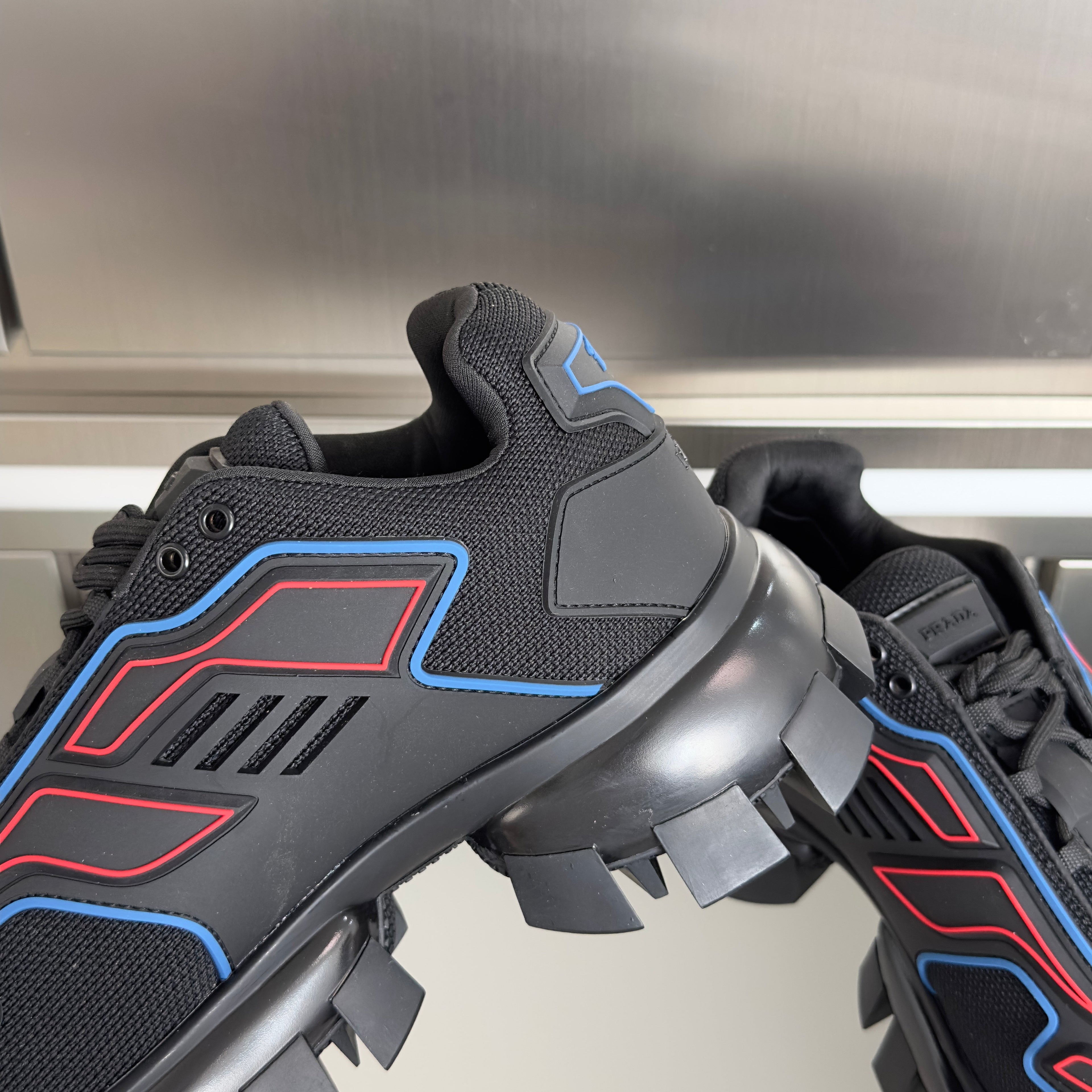 PRADA 26S CLOUDBUST THUNDER SNEAKERS 60MM IN BLACK AND RED MESH FABRIC AND TPU