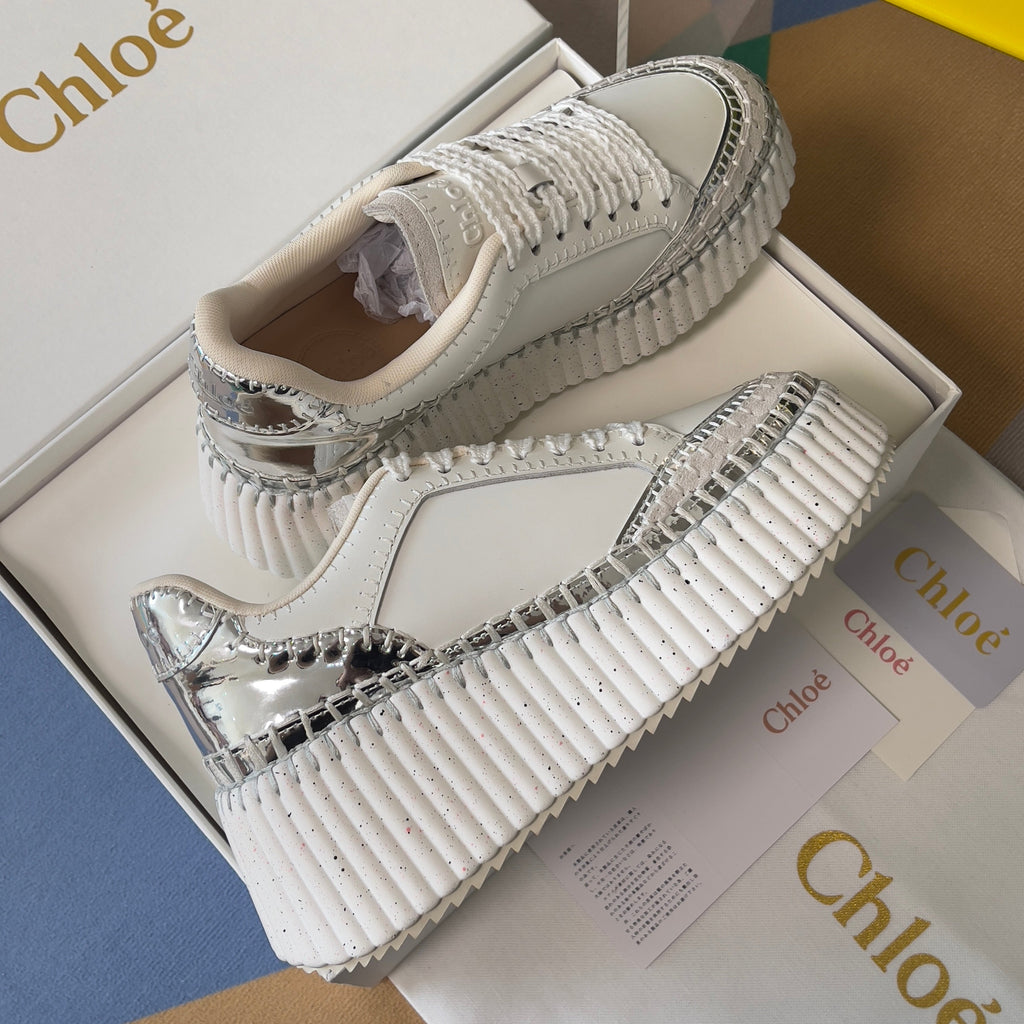 CHLOÉ 26S WEDGE SNEAKERS 70 MM IN WHITE AND SILVER CALFSKIN