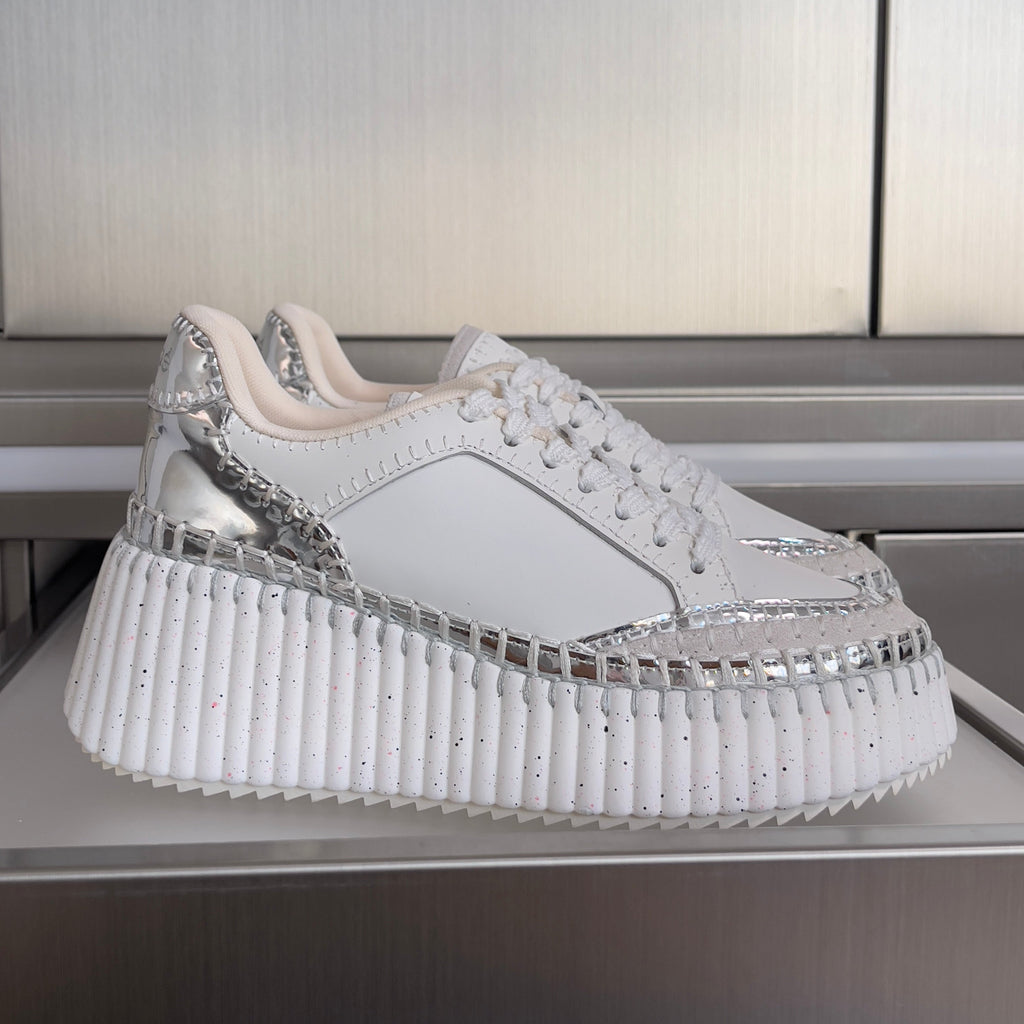 CHLOÉ 26S WEDGE SNEAKERS 70 MM IN WHITE AND SILVER CALFSKIN