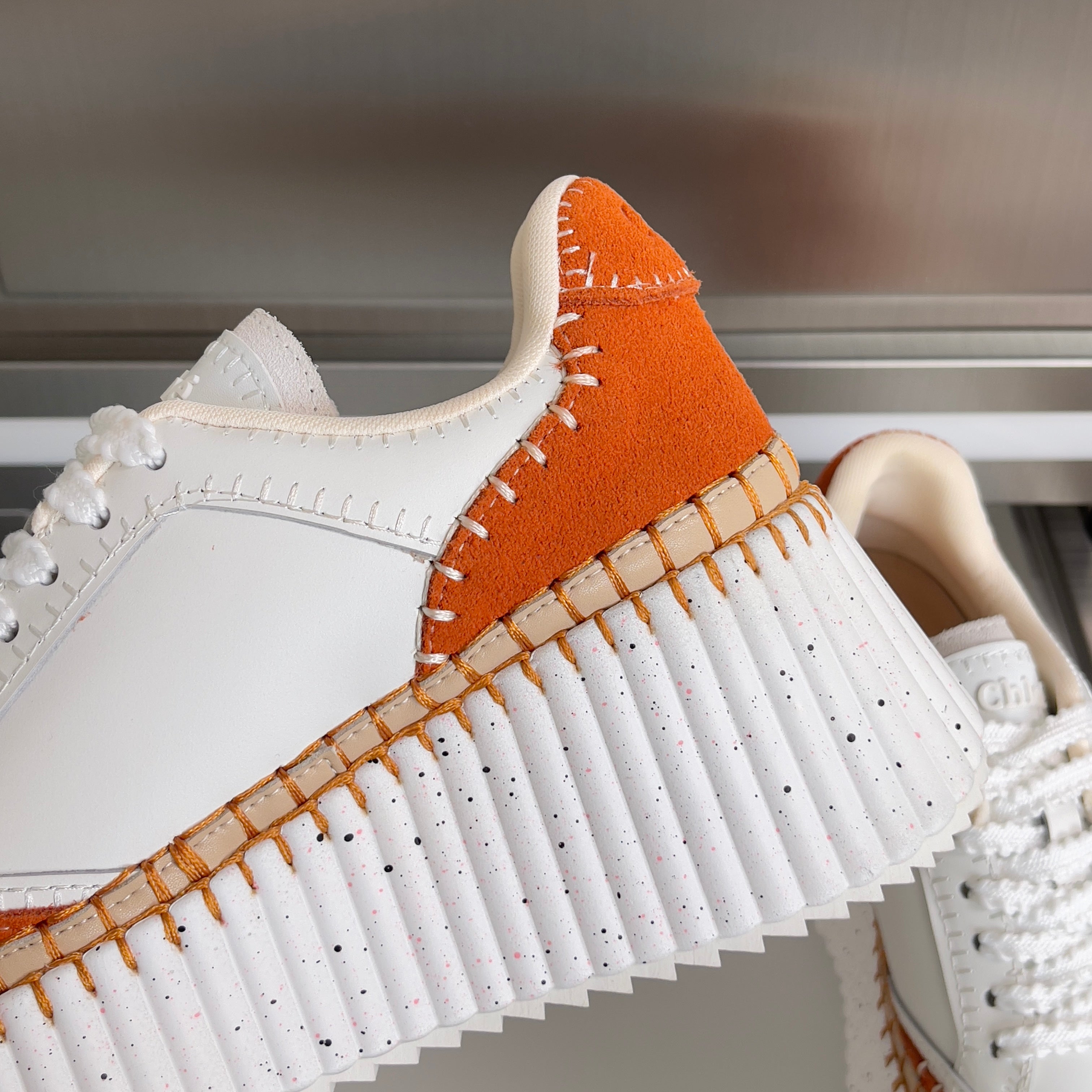 CHLOÉ 26S WEDGE SNEAKERS 70 MM IN WHITE CALFSKIN AND ORANGE SUEDE