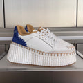 CHLOÉ 26S WEDGE SNEAKERS 70 MM IN WHITE CALFSKIN AND NAVY BLUE SUEDE