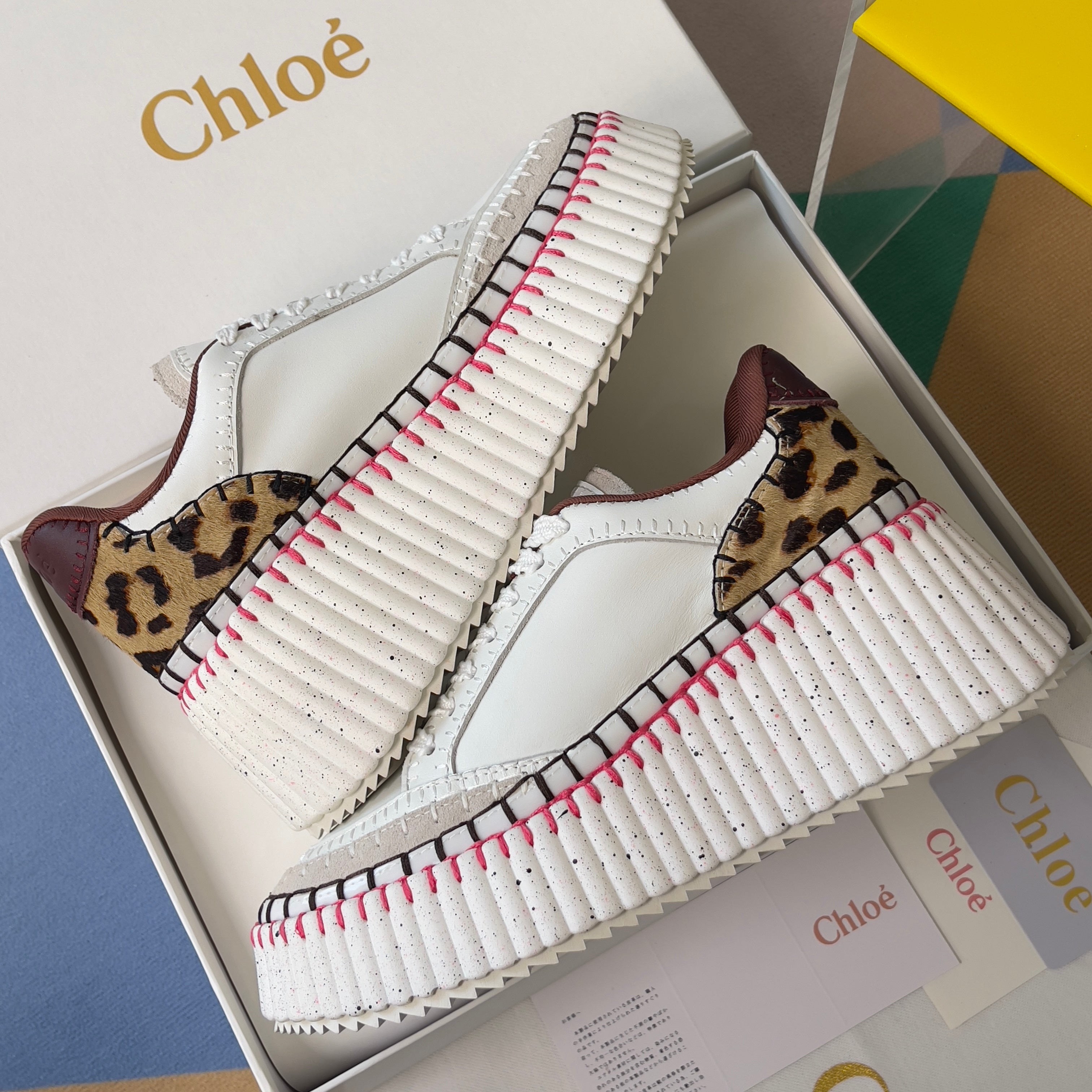 CHLOÉ 26S WEDGE SNEAKERS 70 MM IN WHITE CALFSKIN AND LEOPARD PRINT PONY HAIR