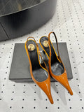 YSL 26S POINTED-TOE SLINGBACK HEELS 105 MM IN DARK ORANGE PATENT CALFSKIN