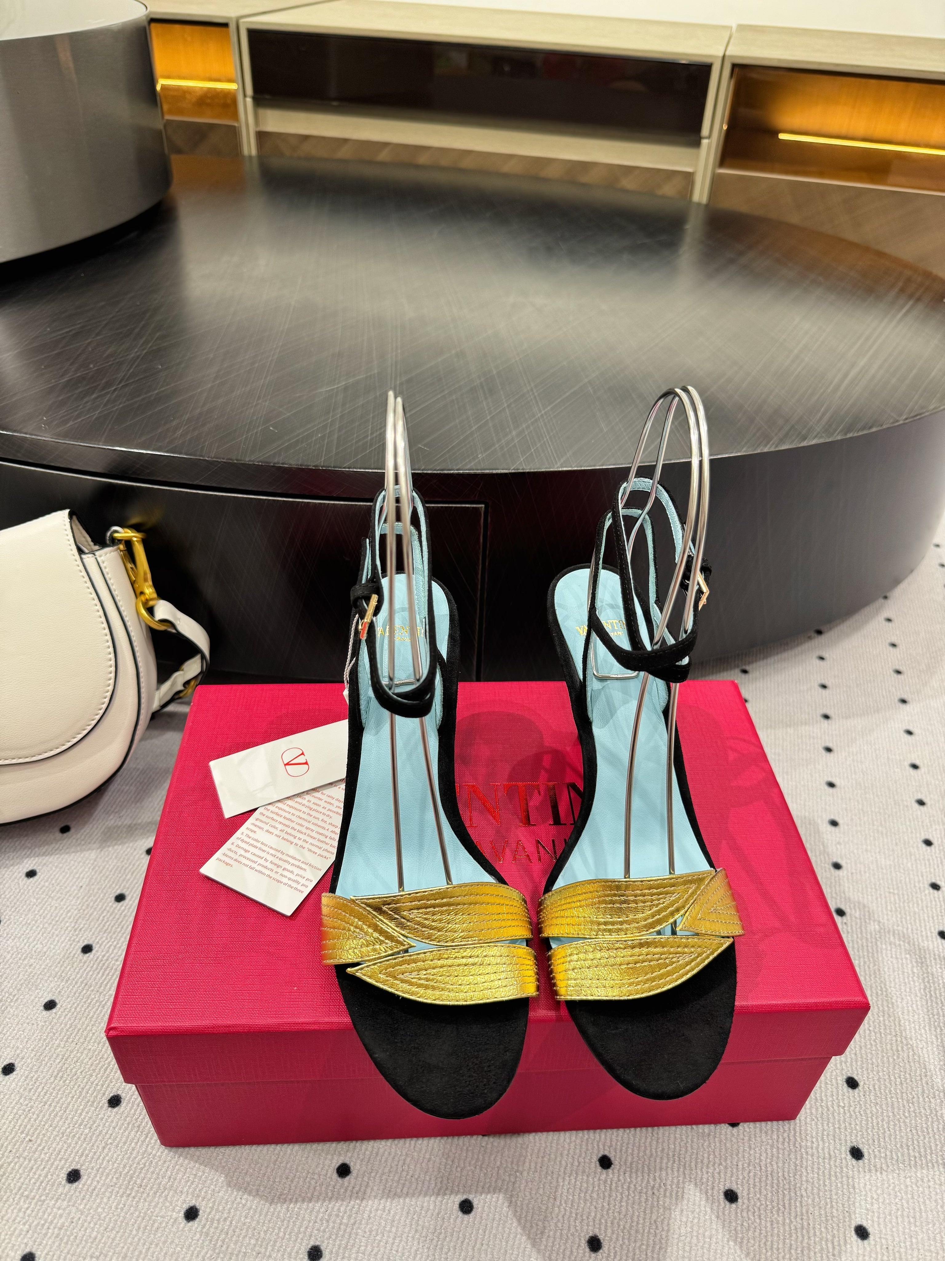VLTN HIGH SANDAL 25S 60 MM IN BLACK SUEDE AND GOLD CALFSKIN