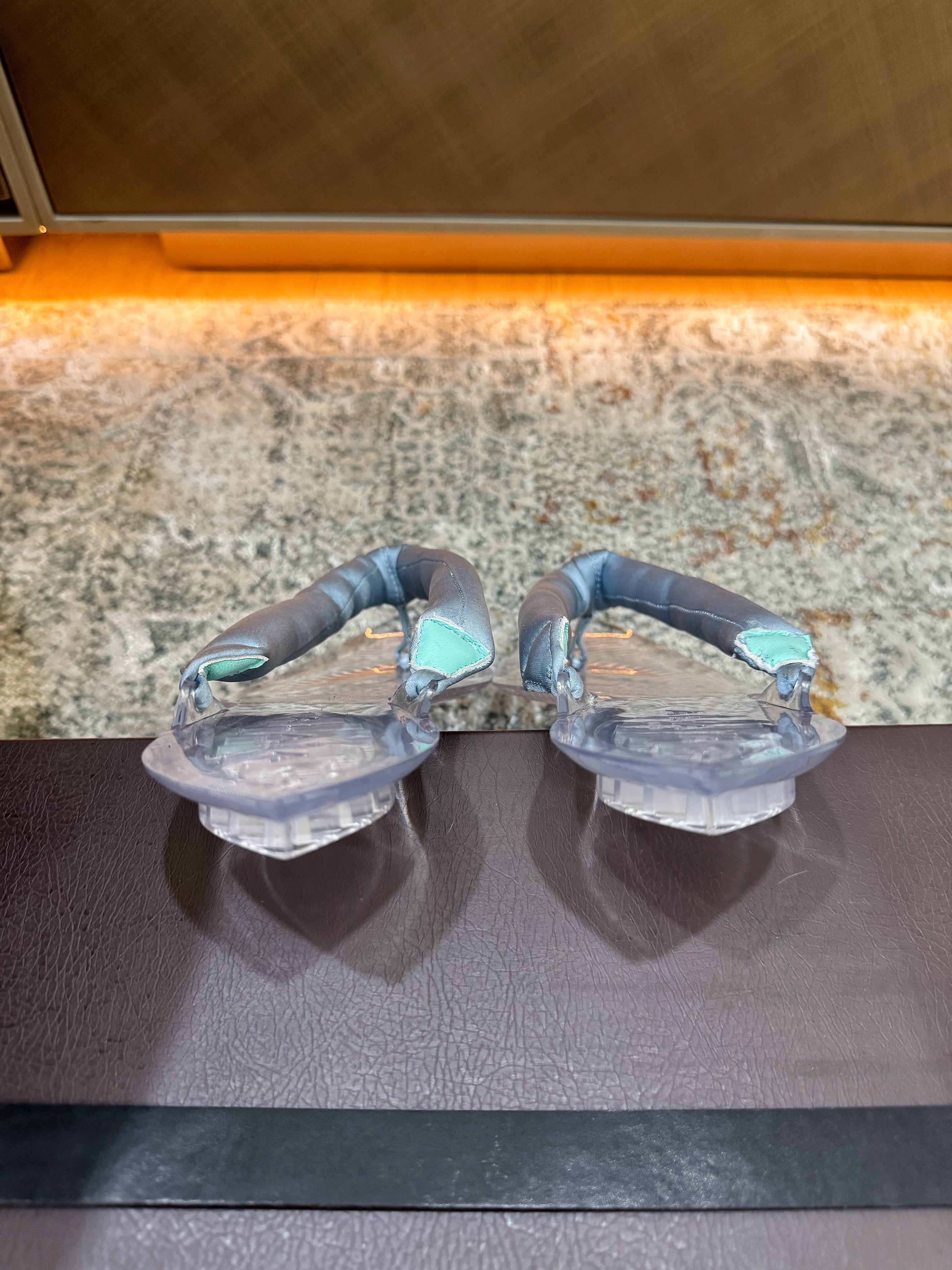 ALAIA 26S THONG SANDALS IN PASTEL BLUE SATIN AND TRANSPARENT PVC