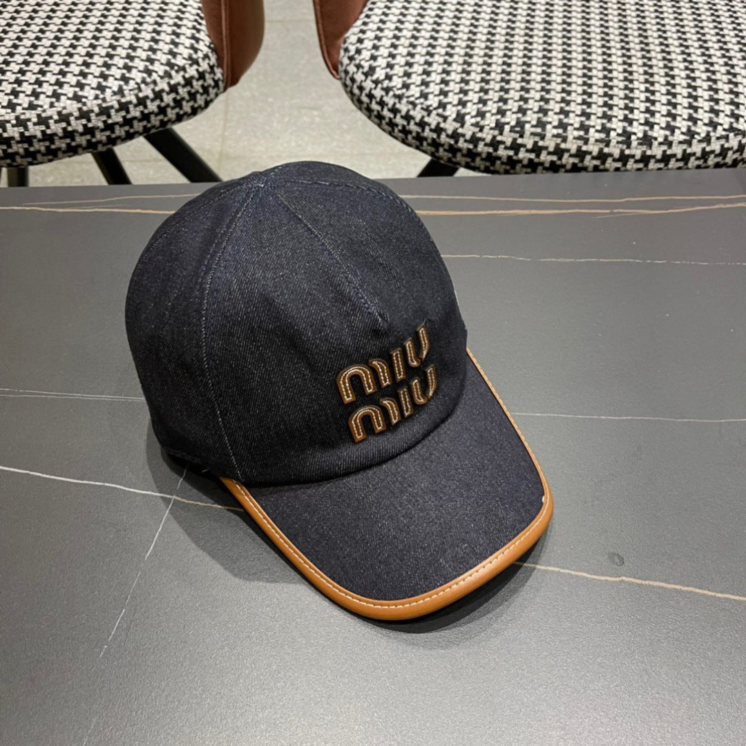 MIUMIU BASEBALL CAP IN NAVY BLUE DENIM AND CALFSKIN