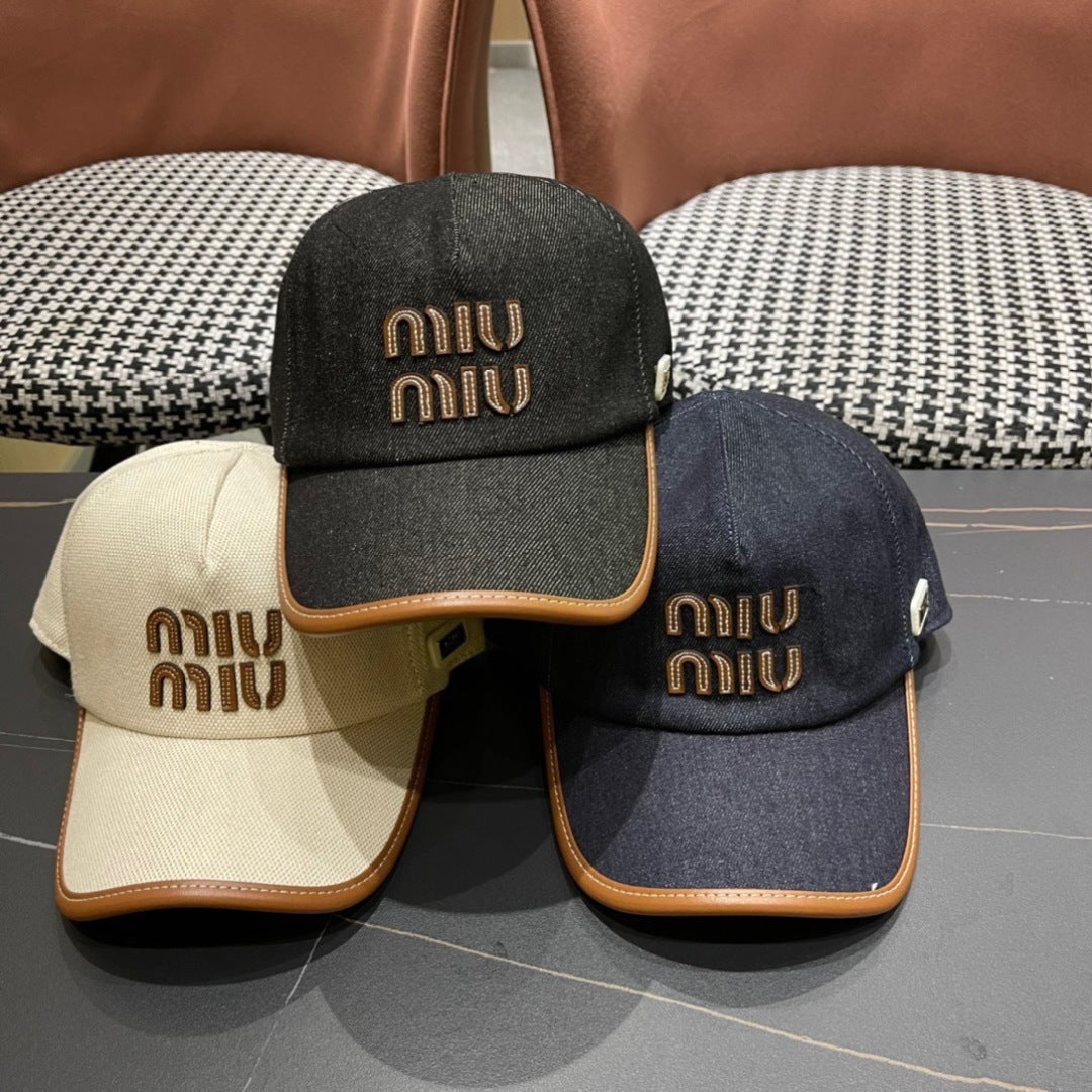 MIUMIU BASEBALL CAP IN NAVY BLUE DENIM AND CALFSKIN