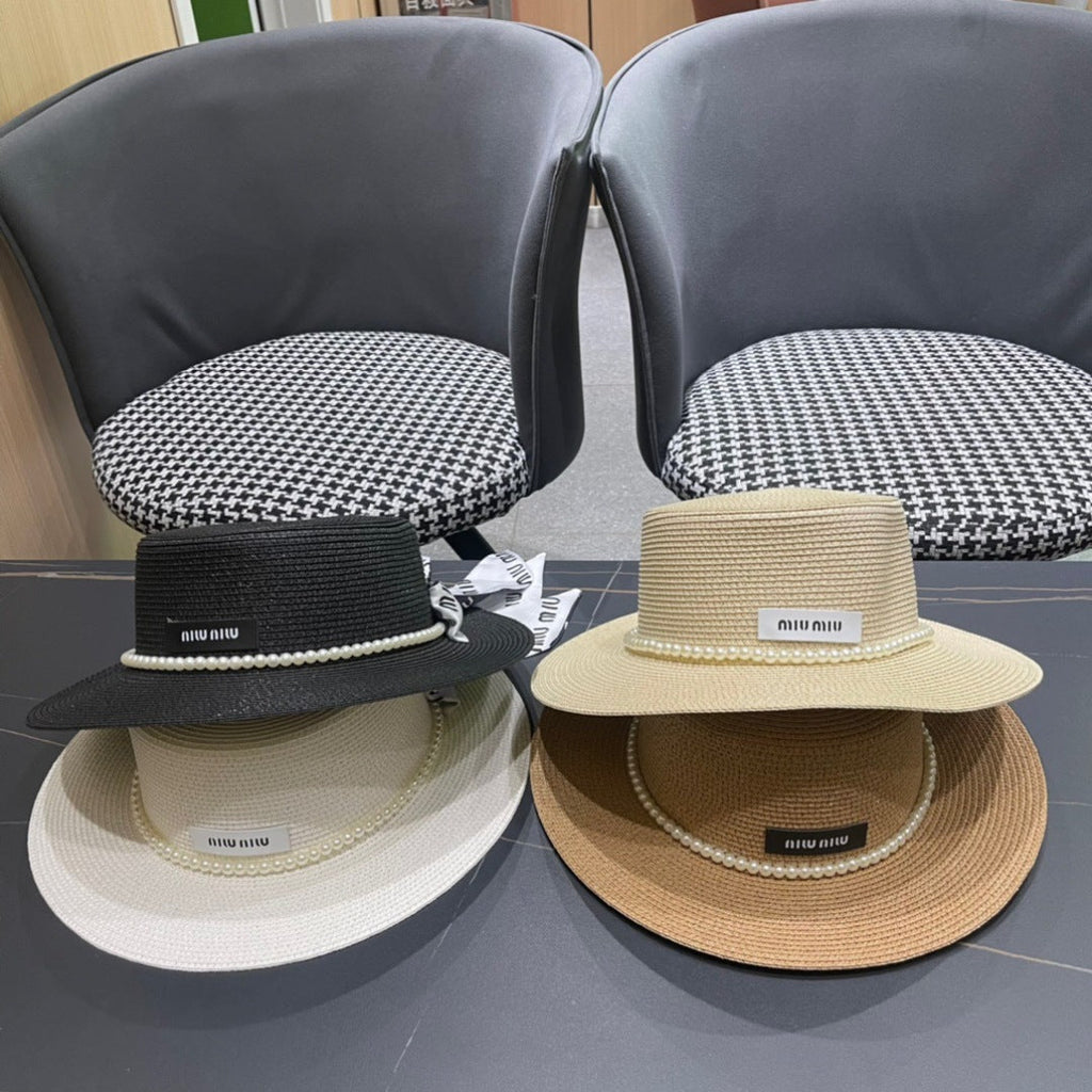 MIUMIU SMALL-BRIM STRAW HAT IN BLACK AND PEARL EMBELLISHED