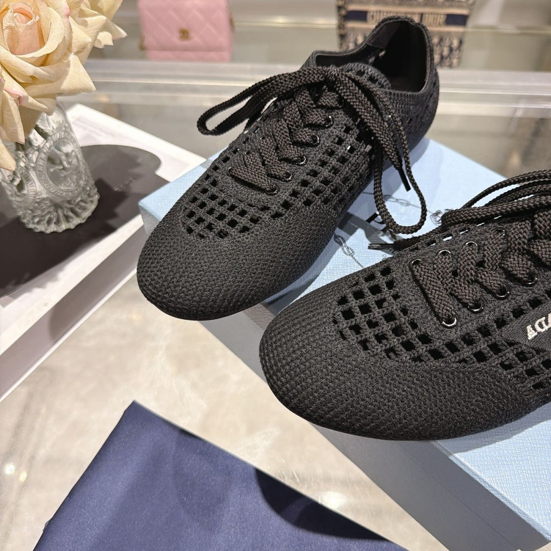 PRADA 26S LACE UP OPENWORK KNIT SNEAKERS IN BLACK KNIT FABRIC