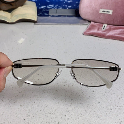 MIUMIU 26S RECTANGULAR FRAME IN METAL 426396