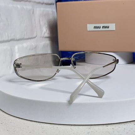 MIUMIU 26S RECTANGULAR FRAME IN METAL 426396