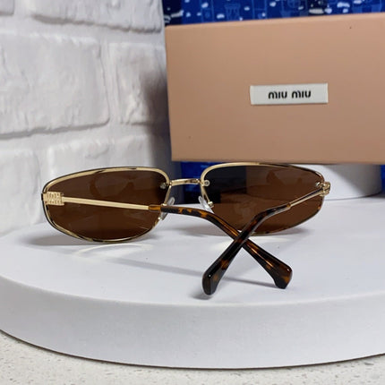 MIUMIU 26S RECTANGULAR FRAME IN METAL 426398