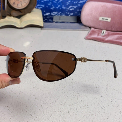 MIUMIU 26S RECTANGULAR FRAME IN METAL 426398