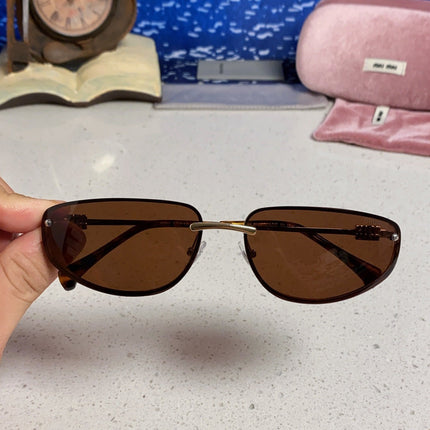 MIUMIU 26S RECTANGULAR FRAME IN METAL 426398