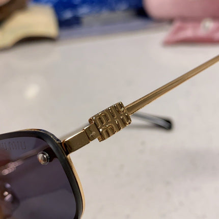 MIUMIU 26S RECTANGULAR FRAME IN METAL 426400