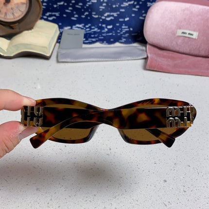 MIUMIU 26S CAT EYE FRAME IN ACETATE 411947