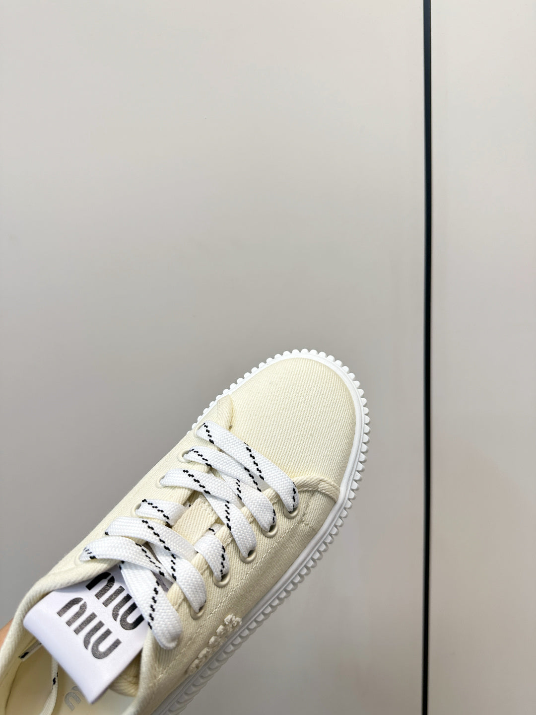 MIUMIU 26S SNEAKER MULES IN LIGHT YELLOW CANVAS