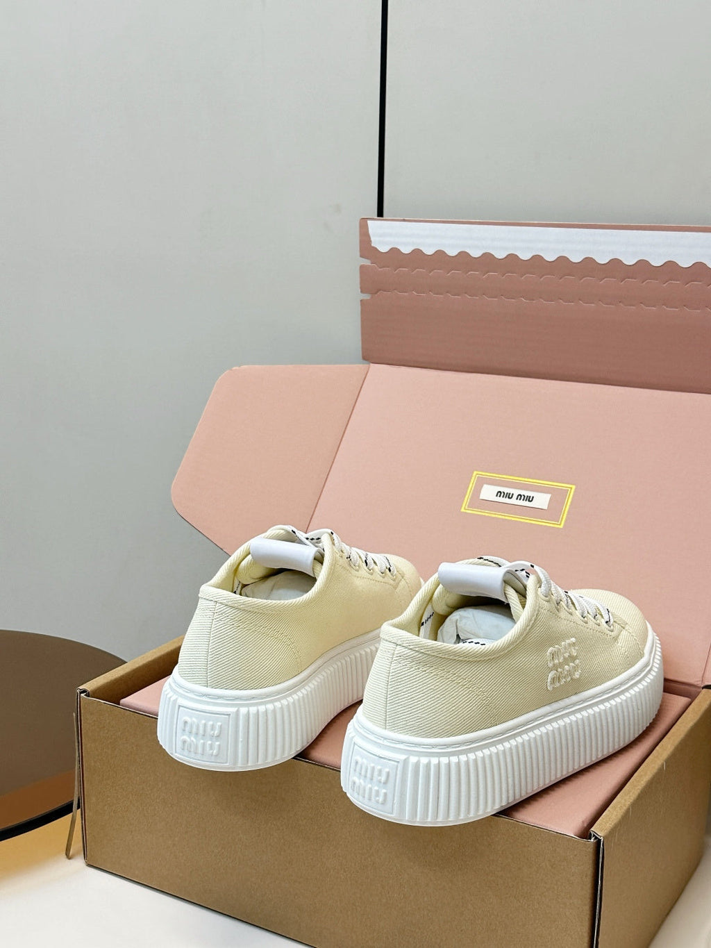 MIUMIU 26S PLATFORM SNEAKERS IN LIGHT YELLOW CANVAS