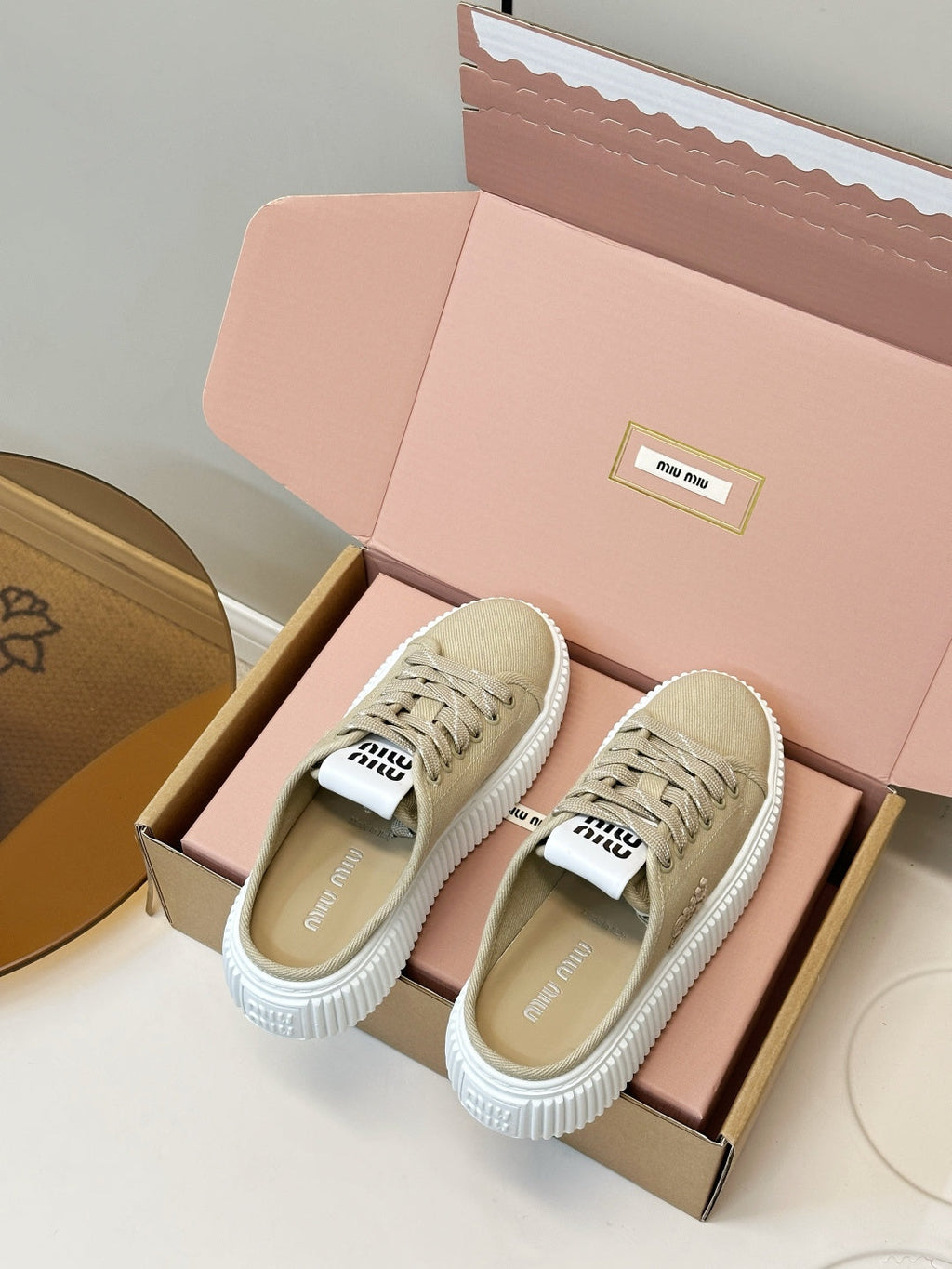 MIUMIU 26S SNEAKER MULES IN BEIGE CANVAS