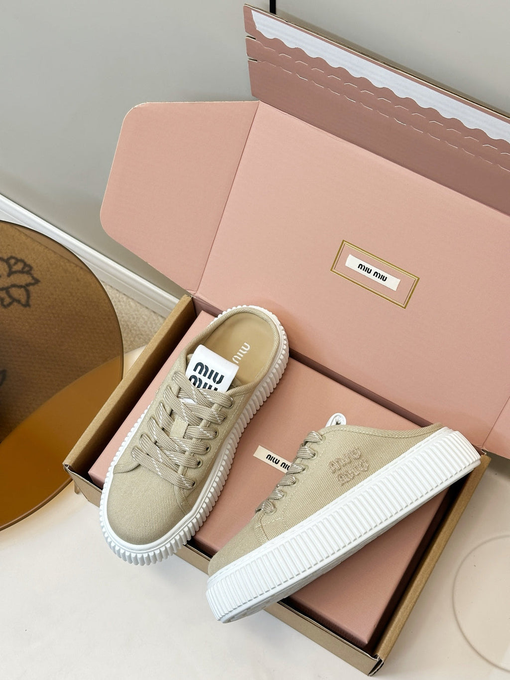 MIUMIU 26S SNEAKER MULES IN BEIGE CANVAS