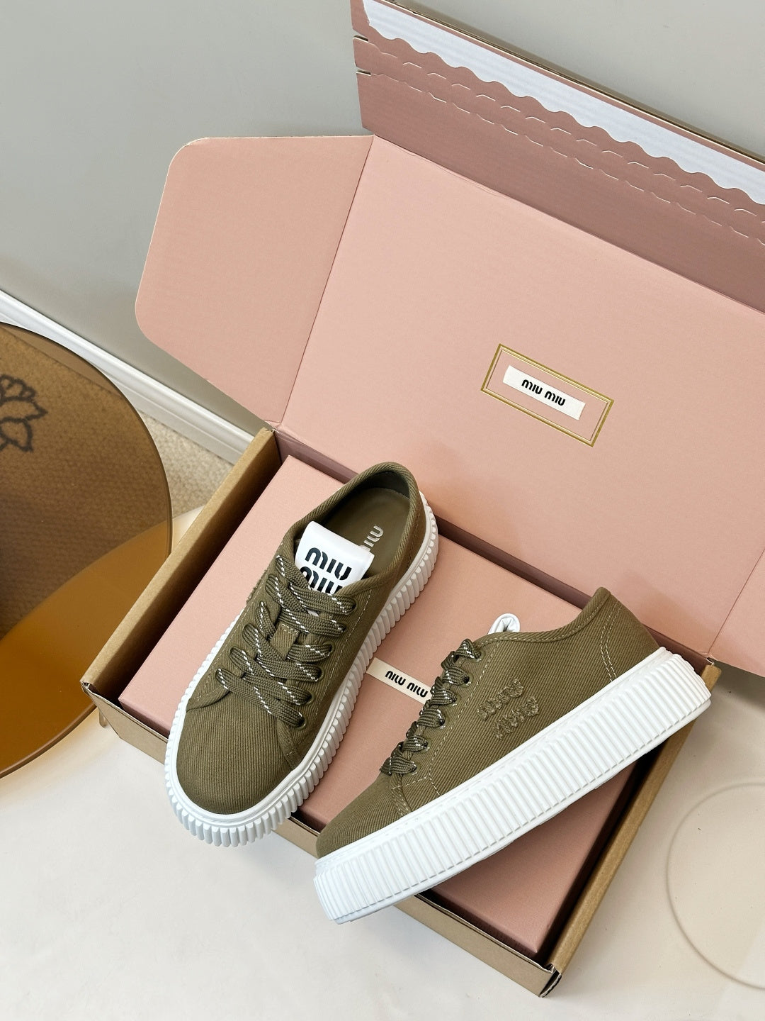 MIUMIU 26S PLATFORM SNEAKERS IN OLIVE GREEN CANVAS