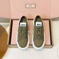 MIUMIU 26S PLATFORM SNEAKERS IN OLIVE GREEN CANVAS