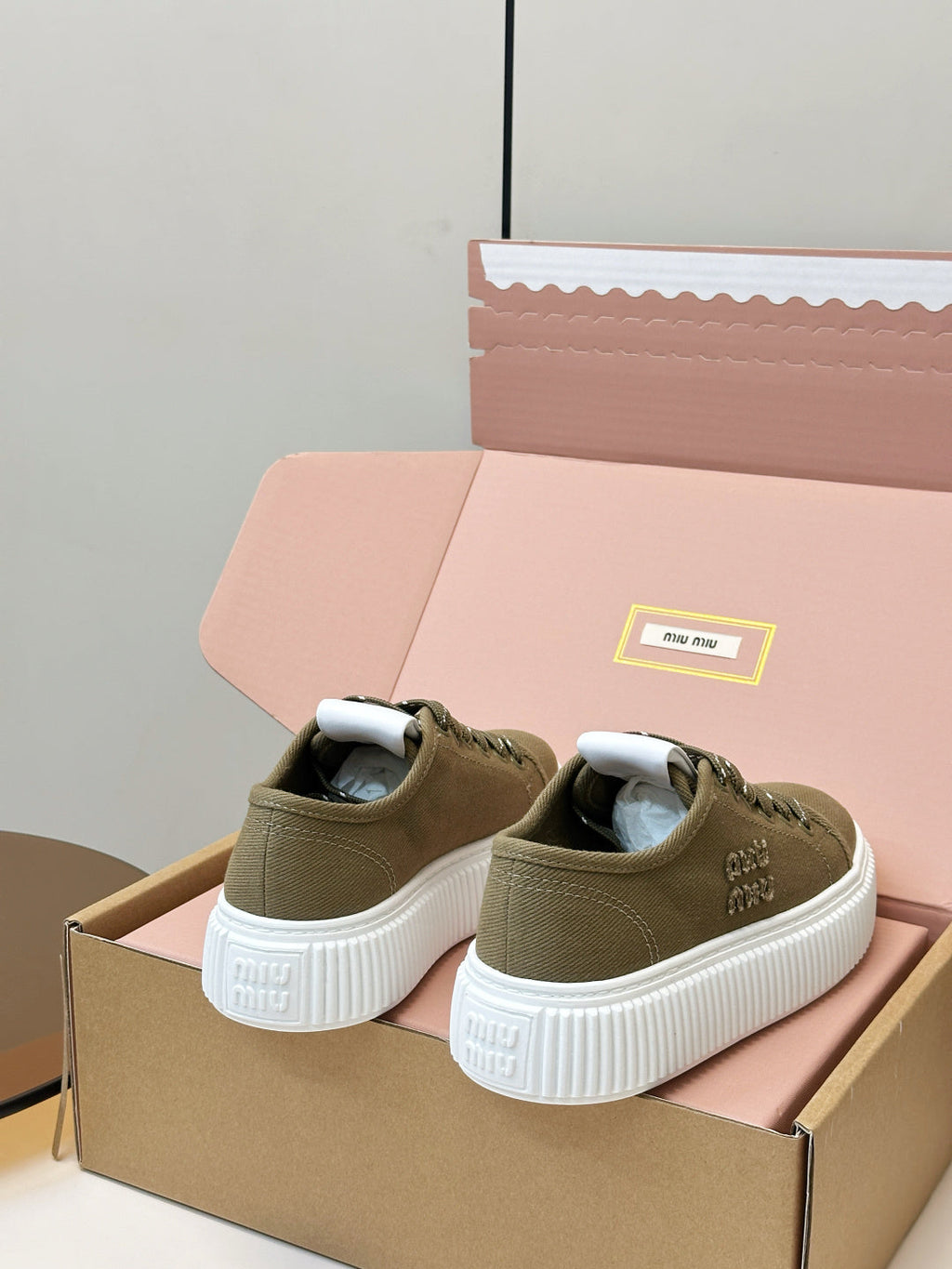 MIUMIU 26S PLATFORM SNEAKERS IN OLIVE GREEN CANVAS