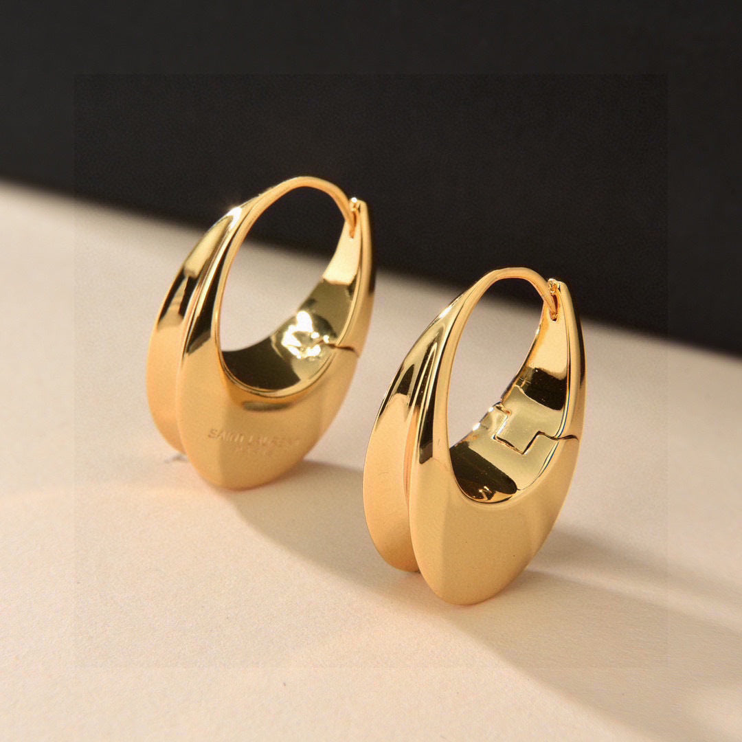 YSL 26S SCULPTED OVAL HOOP EARRINGS IN GOLD TONE METAL 615775