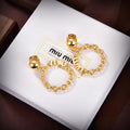 MIUMIU 26S CHAIN HOOP LOGO DROP EARRINGS IN GOLD TONE METAL 617564
