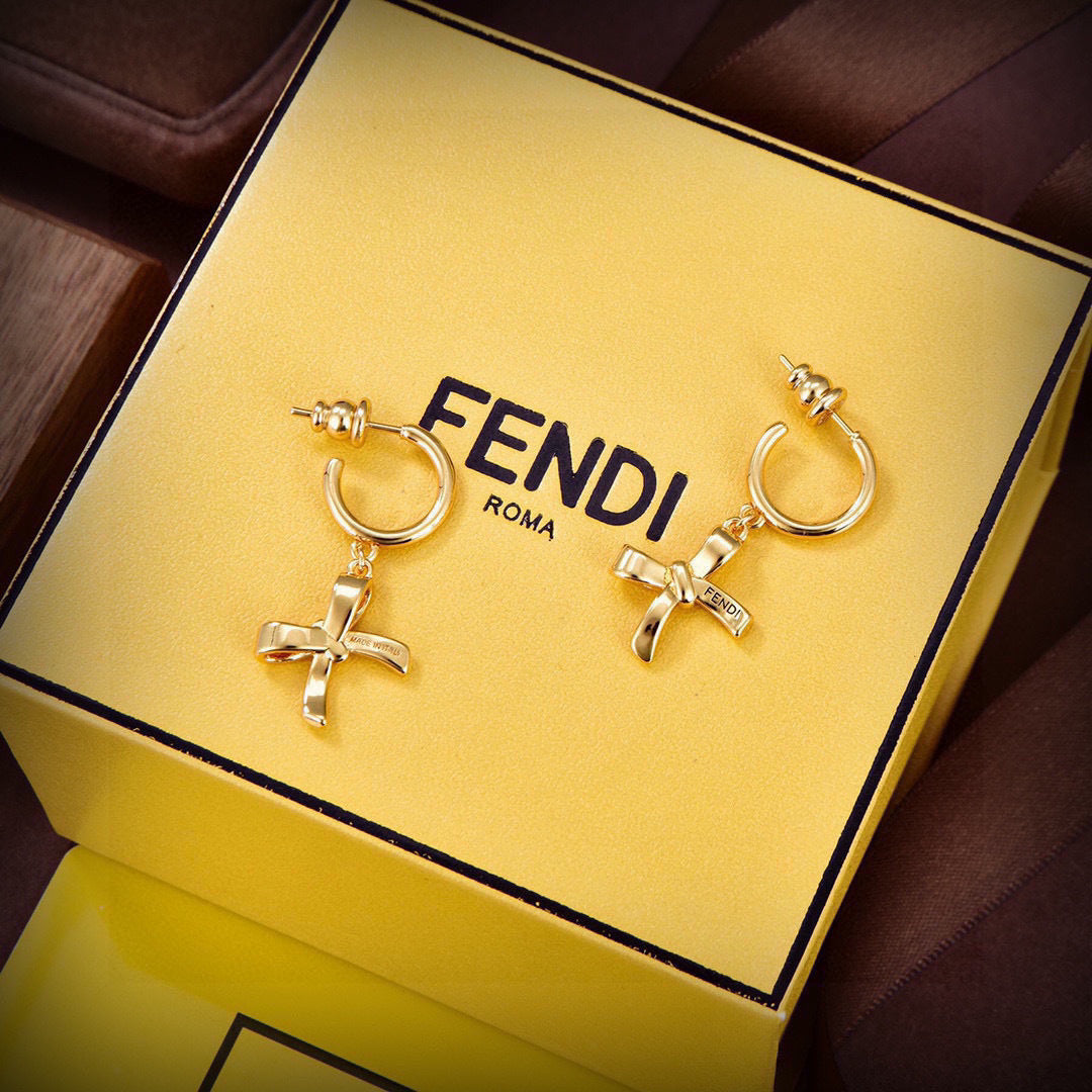FENDI 26S RIBBON CHARM HOOP EARRINGS IN GOLD TONE METAL 621453