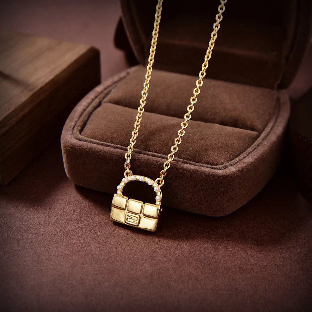 FENDI 26S BAG CHARM PENDANT NECKLACE IN GOLD TONE METAL 625602