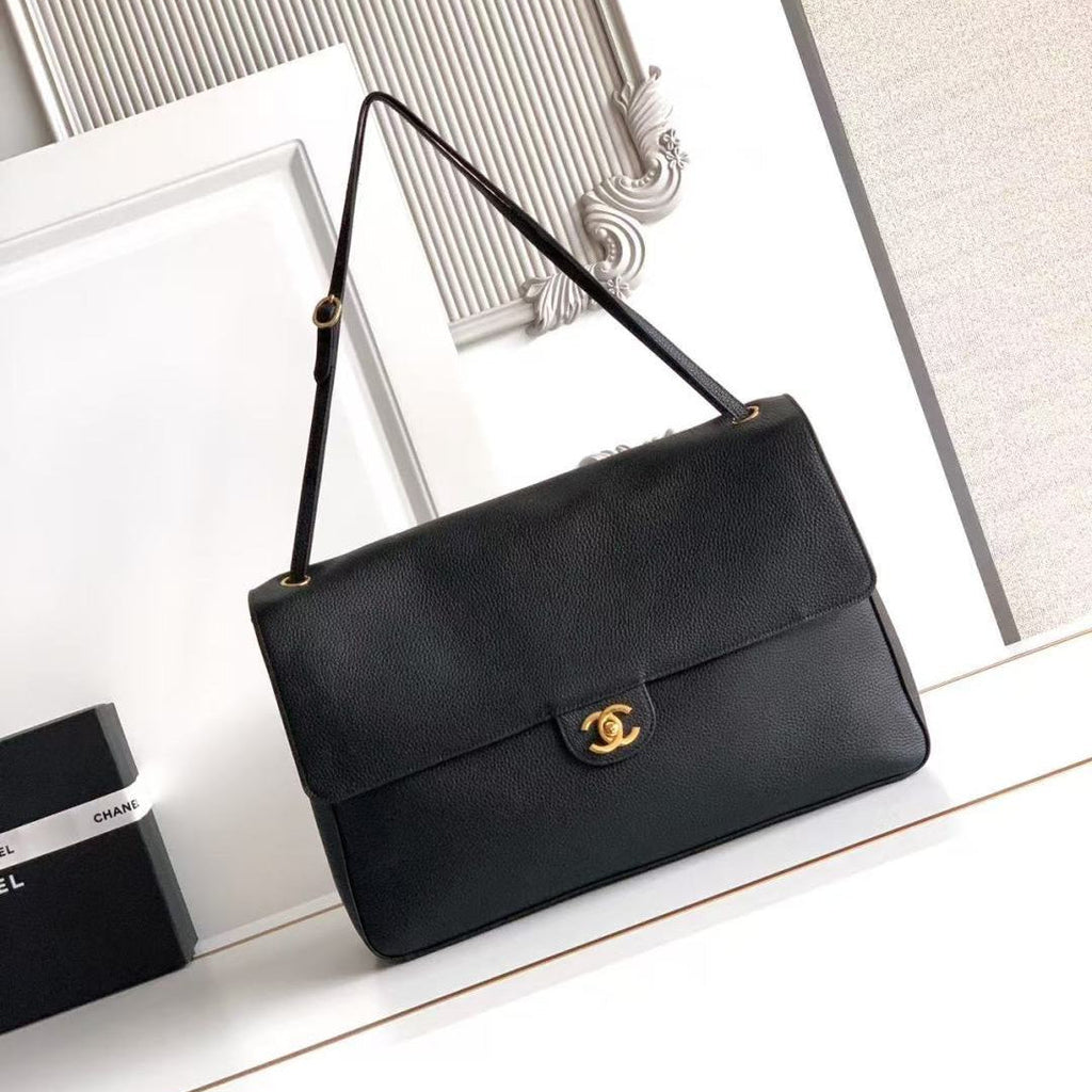 CHANEL 26S SOUPLISSIMO MAXI FLAP 39 IN BLACK GRAINED CALFSKIN GOLD HARDWARE