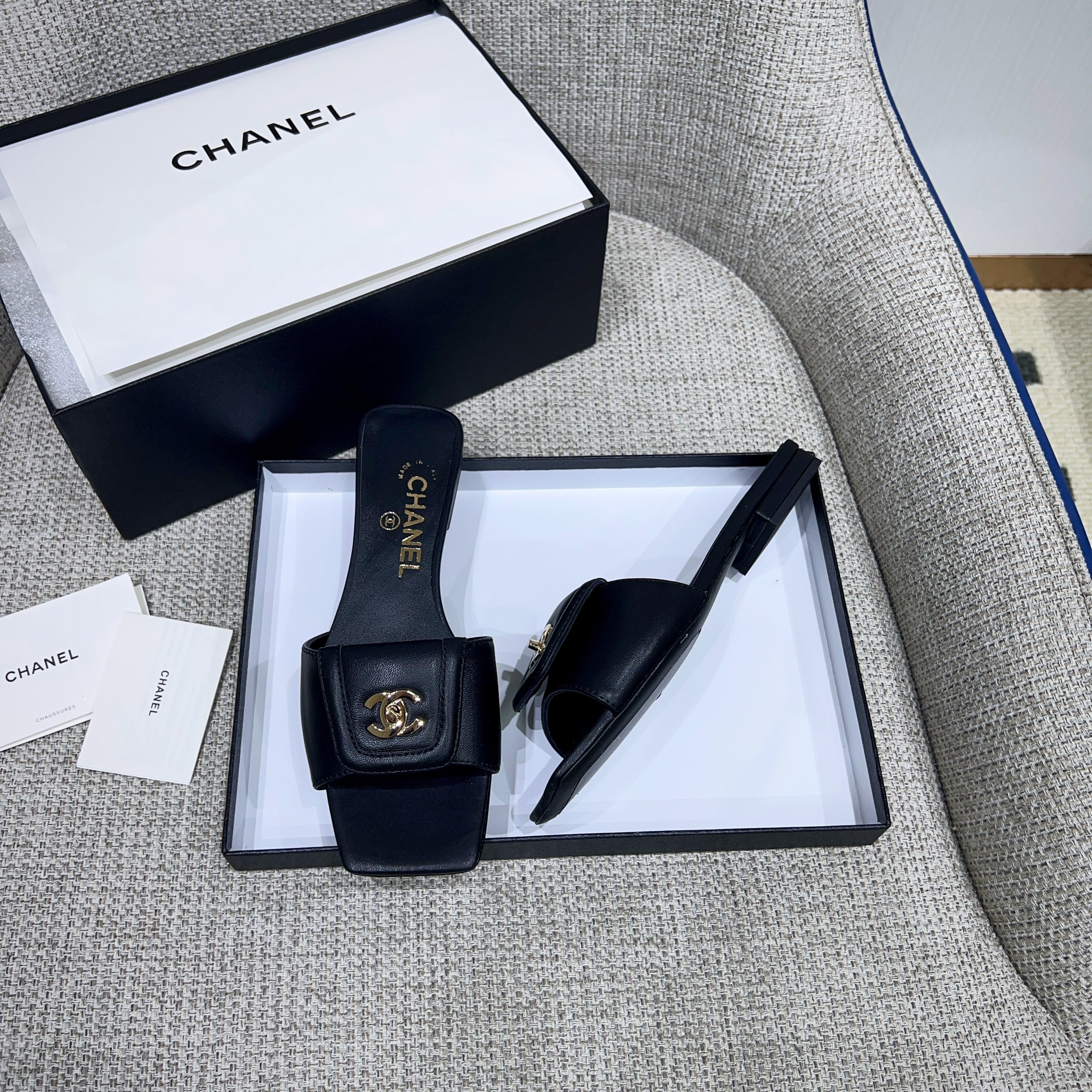 CHANEL 26S FLAT SLIDES IN BLACK LAMBSKIN