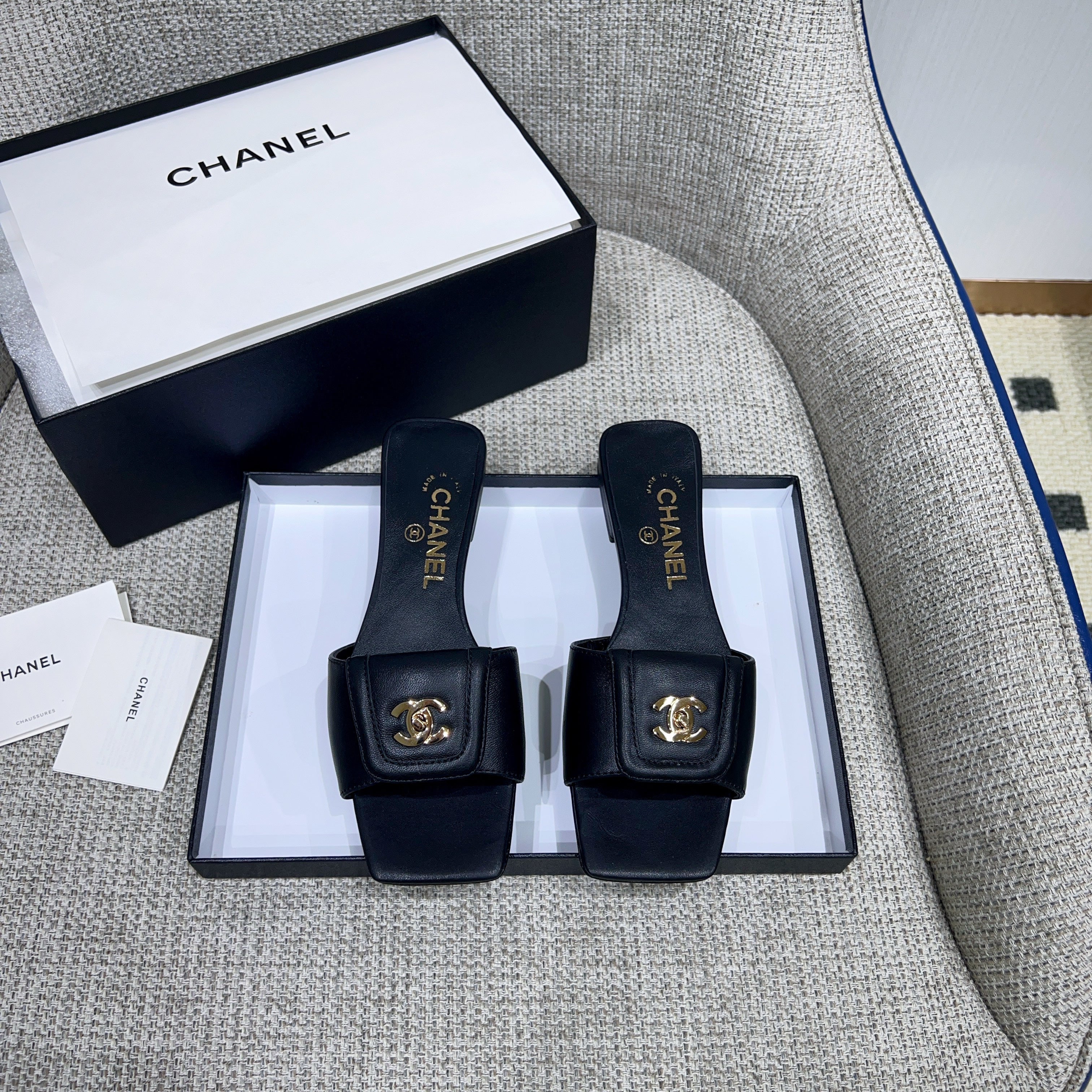 CHANEL 26S FLAT SLIDES IN BLACK LAMBSKIN