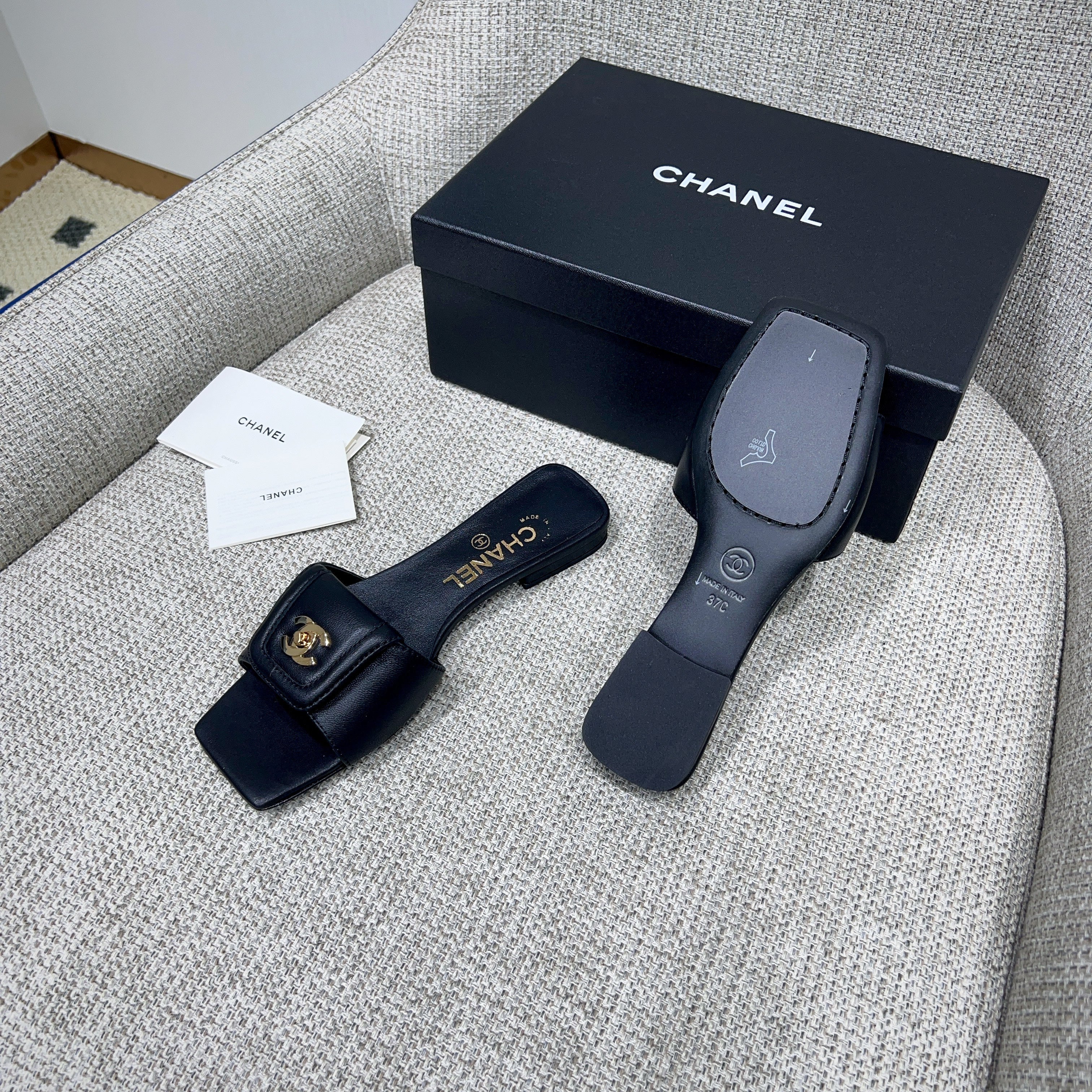CHANEL 26S FLAT SLIDES IN BLACK LAMBSKIN