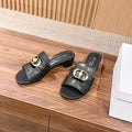 DIOR 26S LOW HEEL SLIDE SANDALS IN BLACK CALFSKIN GOLD PEARL BUCKLE